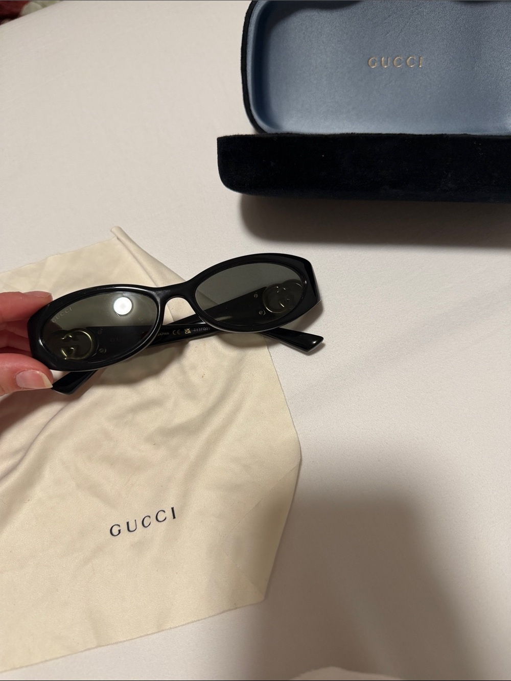 Gucci Black Oval Women's Sunglasses with Velvet Case